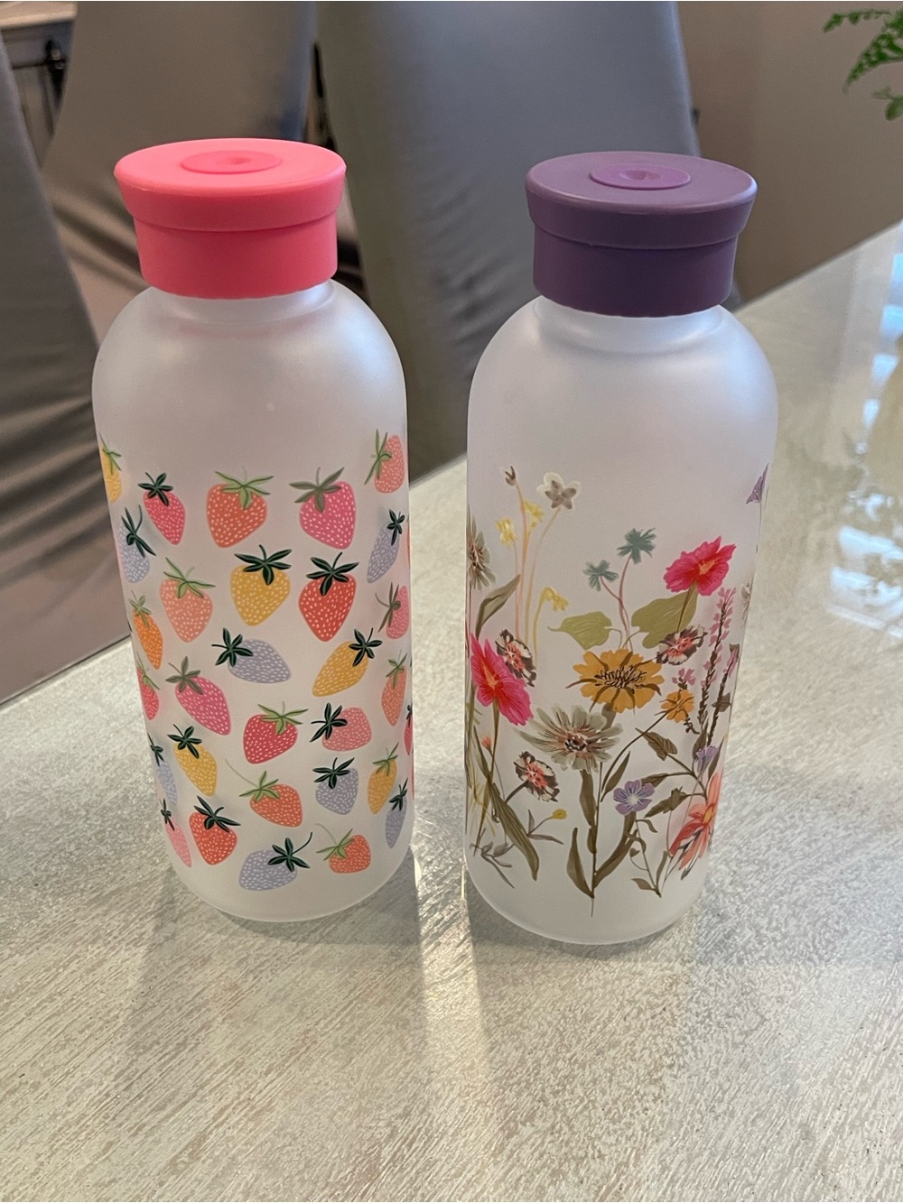 Set of 2 Frosted Floral & Strawberry Glass Water Bottles - Pink & Purple Lids